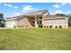 Well maintained house with a large front yard at 1066 Larkin Rd, Spring Hill, FL 34608