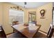 Kitchen breakfast nook with wood table and chairs at 1066 Larkin Rd, Spring Hill, FL 34608