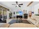 Relaxing living room, featuring large TV and comfy sofas at 1066 Larkin Rd, Spring Hill, FL 34608