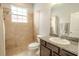 Bathroom with shower, toilet, and granite vanity at 111 Philippe Grand Ct, Safety Harbor, FL 34695