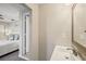 Clean bathroom with vanity and access to bedroom at 1224 Palm St, Clearwater, FL 33755