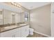 Double vanity bathroom with granite countertops and neutral color scheme at 12403 Streambed Dr, Riverview, FL 33579