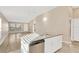 Kitchen island with granite countertop and stainless steel dishwasher at 12403 Streambed Dr, Riverview, FL 33579