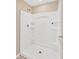 Large walk-in shower with built-in shelves and grab bar at 12403 Streambed Dr, Riverview, FL 33579