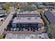 Condo community overview showing building and parking at 1320 Moreland Dr # 20, Clearwater, FL 33764