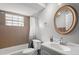 Updated bathroom with tub shower combo and modern vanity at 1320 Moreland Dr # 20, Clearwater, FL 33764
