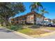 Well-maintained condo building with ample parking and landscaping at 1320 Moreland Dr # 20, Clearwater, FL 33764