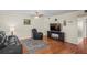 Living room with recliner, sofa, and hardwood floors at 1320 Moreland Dr # 20, Clearwater, FL 33764