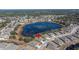 Aerial view showing home's location in a community by a lake at 13987 Weddington Ter, Hudson, FL 34669