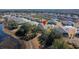 Aerial view showcasing home's location in a lakefront community at 13987 Weddington Ter, Hudson, FL 34669