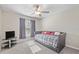 Bedroom with daybed and TV at 13987 Weddington Ter, Hudson, FL 34669
