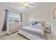 Bedroom with dresser and bed at 13987 Weddington Ter, Hudson, FL 34669