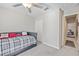 Bedroom with daybed and access to bath at 13987 Weddington Ter, Hudson, FL 34669