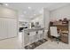 Kitchen with breakfast bar and built-in workspace at 13987 Weddington Ter, Hudson, FL 34669