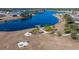 Peaceful lake with a firepit and picnic tables at 13987 Weddington Ter, Hudson, FL 34669