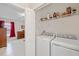 Laundry room with washer and dryer at 13987 Weddington Ter, Hudson, FL 34669
