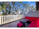 Outdoor patio furniture overlooking a tranquil pond at 13987 Weddington Ter, Hudson, FL 34669