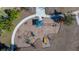 Overhead view of a playground with a shaded area and play equipment at 13987 Weddington Ter, Hudson, FL 34669