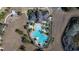 Community pool with adjacent playground and clubhouse at 13987 Weddington Ter, Hudson, FL 34669