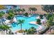 Relaxing freeform pool with plenty of lounge chairs at 13987 Weddington Ter, Hudson, FL 34669