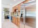 Modern kitchen with stainless steel appliances and granite countertops at 1447 Santa Anna Dr, Dunedin, FL 34698