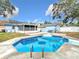 Relaxing view of the refreshing pool area at 1447 Santa Anna Dr, Dunedin, FL 34698