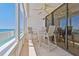 Ocean view balcony with seating for outdoor enjoyment at 17940 Gulf Blvd # 15C, Redington Shores, FL 33708