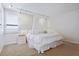 Guest bedroom with king-size bed and white canopy at 17940 Gulf Blvd # 15C, Redington Shores, FL 33708