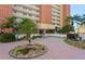 Attractive building exterior with landscaping at 17940 Gulf Blvd # 15C, Redington Shores, FL 33708