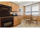 Well-equipped kitchen with ample cabinetry at 17940 Gulf Blvd # 15C, Redington Shores, FL 33708
