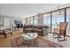 Spacious living room with ocean view and comfortable seating at 17940 Gulf Blvd # 15C, Redington Shores, FL 33708