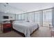 Main bedroom with king bed and mirrored walls at 17940 Gulf Blvd # 15C, Redington Shores, FL 33708