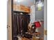 Storage area with wine rack and various items at 17940 Gulf Blvd # 15C, Redington Shores, FL 33708