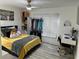 Bedroom with a queen bed, workspace and ample closet space at 18827 Tournament Trl, Tampa, FL 33647