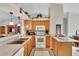 Nice kitchen with oak cabinets and granite countertops at 201 Lookout Dr, Apollo Beach, FL 33572