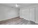 Bedroom with double closets and wood-look flooring at 2238 13Th Sw Ave, Largo, FL 33770