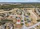 Aerial view showing the property's location within a residential community at 2309 Cross Tee Ct, Brooksville, FL 34604