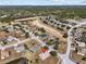 Aerial view of a house and surrounding neighborhood, showcasing the community and location at 2309 Cross Tee Ct, Brooksville, FL 34604
