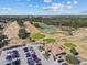 Aerial view of the golf course and clubhouse, showing the expansive layout and recreational opportunities at 2309 Cross Tee Ct, Brooksville, FL 34604