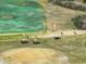 Aerial view of golfers on the course and golf carts, highlighting the recreational amenities at 2309 Cross Tee Ct, Brooksville, FL 34604