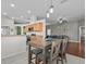 Kitchen features a breakfast bar and adjacent dining area at 2309 Cross Tee Ct, Brooksville, FL 34604