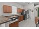 Modern kitchen features stainless steel appliances and ample cabinetry at 2309 Cross Tee Ct, Brooksville, FL 34604
