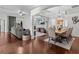 Open concept living and dining area with hardwood floors at 2309 Cross Tee Ct, Brooksville, FL 34604