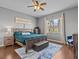 Spacious main bedroom with wood flooring and large windows at 2309 Cross Tee Ct, Brooksville, FL 34604