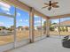 Relaxing screened porch overlooking backyard at 2309 Cross Tee Ct, Brooksville, FL 34604