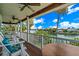 Relaxing deck with seating and stunning water views at 2503 Pass A Grille Way, St Pete Beach, FL 33706