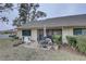 Private backyard with patio, landscaping and seating at 2579 Bay Berry Dr # 42D, Clearwater, FL 33763