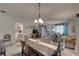 Dining area with a view of the living room and bedroom at 2579 Bay Berry Dr # 42D, Clearwater, FL 33763