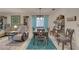 Casual dining area with a wooden table and comfortable seating at 2579 Bay Berry Dr # 42D, Clearwater, FL 33763