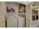 Practical laundry area with washer, dryer, and storage at 2579 Bay Berry Dr # 42D, Clearwater, FL 33763